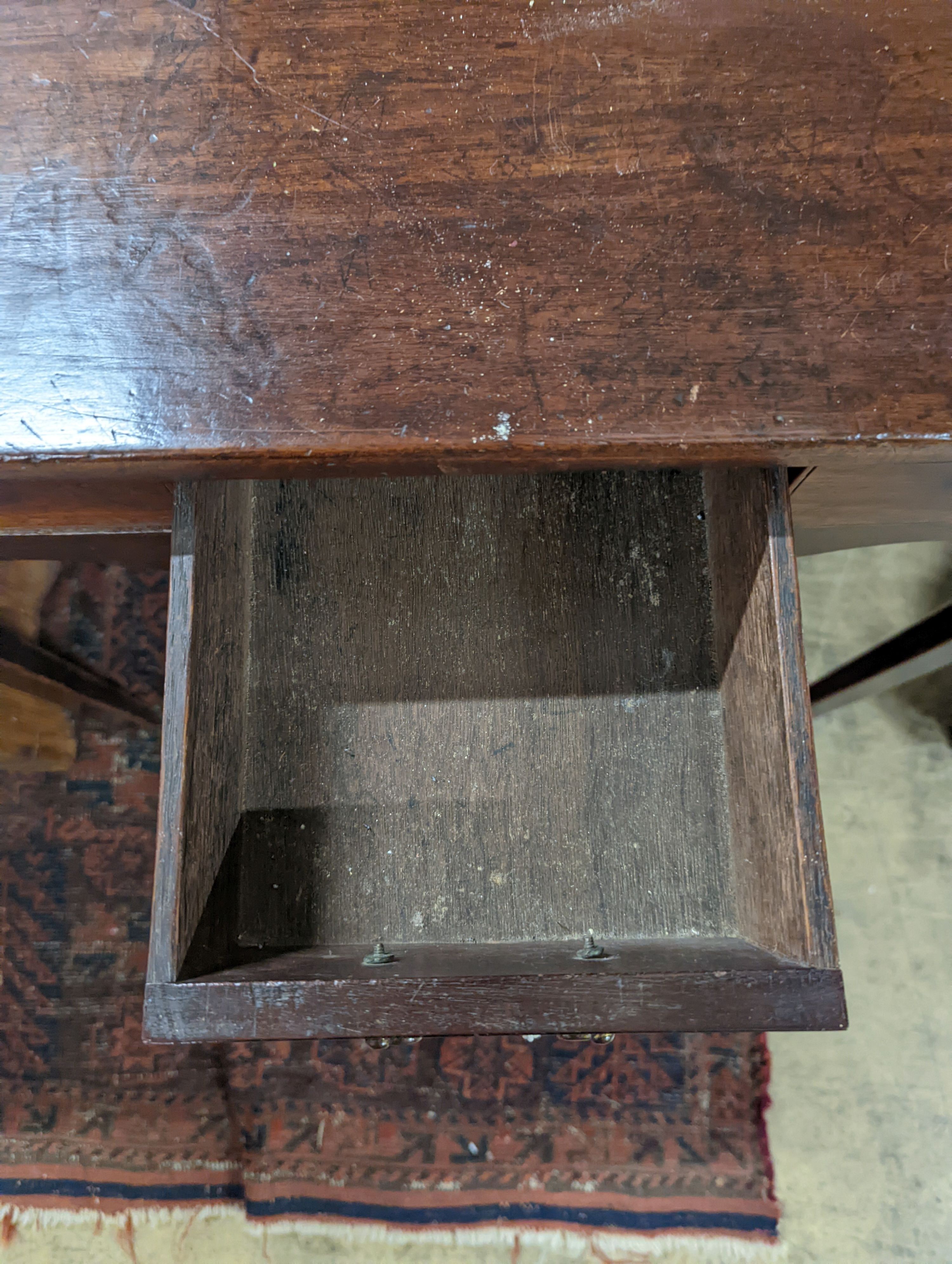 A George III mahogany side table with three drawers, width 75cm, depth 44cm, height 72cm